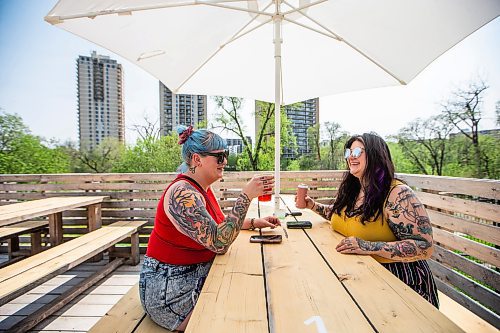 MIKAELA MACKENZIE / WINNIPEG FREE PRESS
 
Breeann Kysuk (left) and Kelly Sangalang enjoy drinks at The Beer Can on Monday, May 15, 2023. For patio Wasney story.

Winnipeg Free Press 2023.