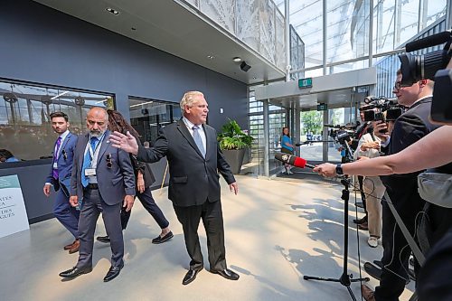RUTH BONNEVILLE / WINNIPEG FREE PRESS

Local -  Leaf Premiers and Indigenous leaders meeting 

Photo of Ontario Premier, Doug Ford,  arriving at the Leaf and scrumming with the media before heading into a meeting with Premiers and Indigenous leaders at The Leaf at Assiniboine Park Monday,.

Story:  Premier is hosting premiers and Indigenous leaders for a meeting at The Leaf at Assiniboine Park Monday.This is of several meetings being held over a three-day conference in Winnipeg.


July 10th,  2023
