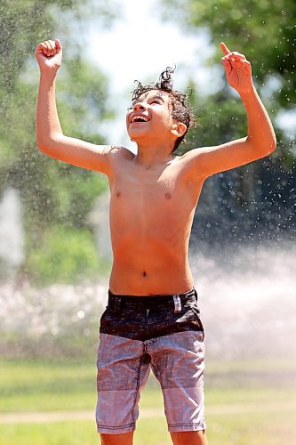 10072023
Eleven-year-old Rocklin (no last name given) smiles while enjoying the Stanley Park spray park in Brandon on a warm Monday afternoon.
(Tim Smith/The Brandon Sun)