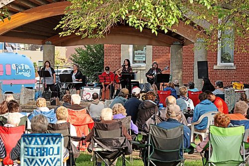 Brandonites take advantage of a beautiful Tuesday evening to listen to Hearts Desire perform at Princess Park as part of the Music in the Park summer music series. (Tim Smith/The Brandon Sun)