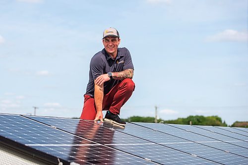 MIKAELA MACKENZIE / WINNIPEG FREE PRESS

Daniel Hartley, owner of PowerTec Electric Inc, at his solar and electric business on Tuesday, July 11, 2023.  They recently completed a solar project in St. Theresa Point First Nation that will power two schools there and save the band about $50,000 per year. For &#x2014; story.
Winnipeg Free Press 2023.