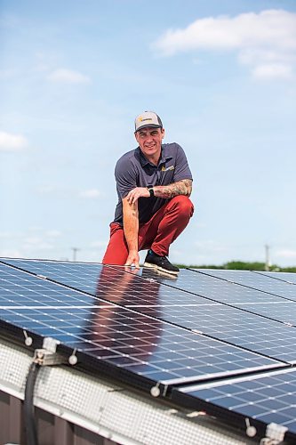 MIKAELA MACKENZIE / WINNIPEG FREE PRESS

Daniel Hartley, owner of PowerTec Electric Inc, at his solar and electric business on Tuesday, July 11, 2023.  They recently completed a solar project in St. Theresa Point First Nation that will power two schools there and save the band about $50,000 per year. For &#x2014; story.
Winnipeg Free Press 2023.