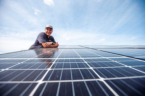 MIKAELA MACKENZIE / WINNIPEG FREE PRESS

Daniel Hartley, owner of PowerTec Electric Inc, at his solar and electric business on Tuesday, July 11, 2023.  They recently completed a solar project in St. Theresa Point First Nation that will power two schools there and save the band about $50,000 per year. For &#x2014; story.
Winnipeg Free Press 2023.