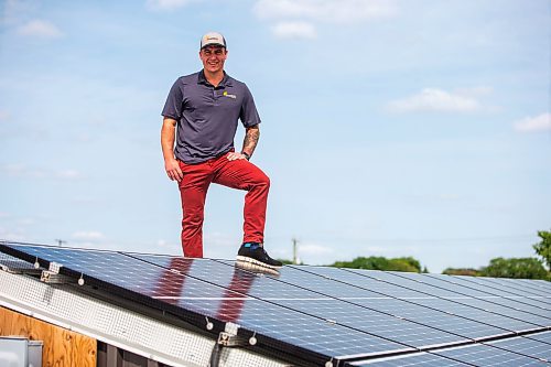 MIKAELA MACKENZIE / WINNIPEG FREE PRESS

Daniel Hartley, owner of PowerTec Electric Inc, at his solar and electric business on Tuesday, July 11, 2023.  They recently completed a solar project in St. Theresa Point First Nation that will power two schools there and save the band about $50,000 per year. For &#x2014; story.
Winnipeg Free Press 2023.