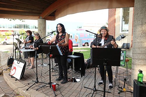 11072023
Brandonites take advantage of a beautiful Tuesday evening to listen to Hearts Desire perform at Princess Park as part of the Music in the Park summer music series. 
(Tim Smith/The Brandon Sun)