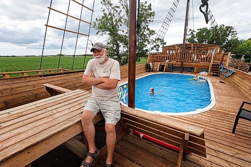 RUTH BONNEVILLE / WINNIPEG FREE PRESS
Doug Cook, a.k.a. Captain Cook, shows off his life-size wooden ship which encases a swimming pool.