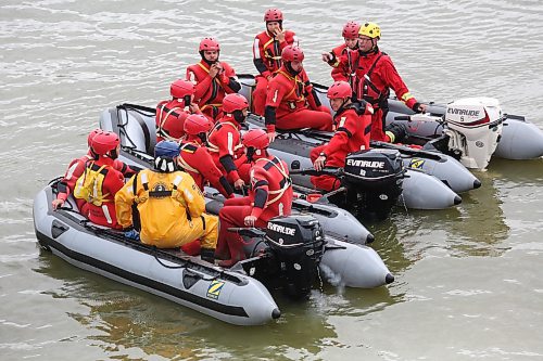 Students with the Manitoba Emergency Services College gather in rafts Assiniboine River as part of course-end life-saving training exercises near the walking bridge at the Riverbank Discovery Centre trails. Ten students and their evaluators took part in the all-day excercises between Dinsdale Park and the bridge on Wednesday. These exercises will continue in Brandon and Rivers until July 19. (Matt Goerzen/The Brandon Sun)
