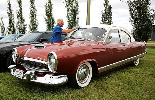 A 1954 Kaiser Special owned by Butch and Val Buchanan of Fargo, N.D near Brandon on Wednesday. There were less than 8,000 of these vehicles built by automobile executive Joseph W. Frazer and industrialist Henry J. Kaiser, who started their company to compete with General Motors, Ford, and Chrysler, but halted production in 1955. (Michele McDougall/The Brandon Sun)