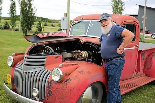 Brandon's Jim Stewart with his 1946 Chevrolet half-ton with the original body, but rebuilt engine and interior near Brandon on Wednesday. Stewart will be one of hundreds of car enthusiasts at this weekend's Western Canada Power Cruise in Medicine Hat, Alta. (Michele McDougall/The Brandon Sun)

