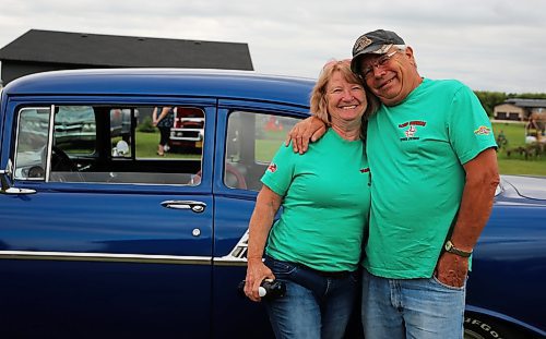 Randy and Cindy Henrickson from Sioux Lookout, ONT., with their 956 Chevrolet Bel Air two door hard top near Brandon on Wednesday. They will be among the hundreds of cars at this weekend's Western Canada Power Cruise in Medicine Hat, AB. (Michele McDougall/The Brandon Sun)