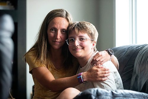 MIKAELA MACKENZIE / WINNIPEG FREE PRESS

Jill Chapman and her son, Adam Donaghy, at their home on Thursday, July 13, 2023. Adam Donaghy is a transgender high schooler who has been on the waiting list for HSC&#x2019;s Gender Dysphoria Assessment and Action for Youth Centre (GDAAY) program for nearly three years.  For Eva/Katie story.
Winnipeg Free Press 2023.