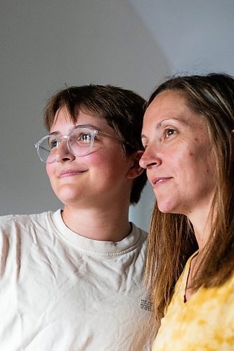 MIKAELA MACKENZIE / WINNIPEG FREE PRESS

Jill Chapman and her son, Adam Donaghy, at their home on Thursday, July 13, 2023. Adam Donaghy is a transgender high schooler who has been on the waiting list for HSC&#x2019;s Gender Dysphoria Assessment and Action for Youth Centre (GDAAY) program for nearly three years.  For Eva/Katie story.
Winnipeg Free Press 2023.