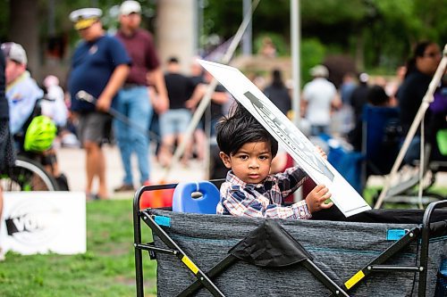 MIKAELA MACKENZIE / WINNIPEG FREE PRESS

Amos Corpuz, two, plays with a lawn sign at the Disability Matters Vote Campaign at The Forks on Thursday, July 13, 2023. Standup.
Winnipeg Free Press 2023.