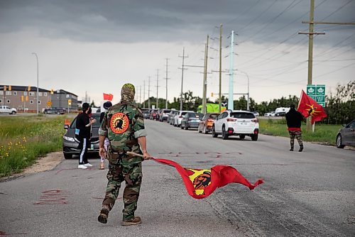 JESSICA LEE / WINNIPEG FREE PRESS

A protestor is photographed at the Brady Landfill July 14, 2023.

Reporter: Chris Kitching