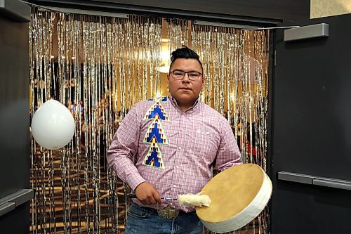 Zephran Bone from Sioux Valley poses for a photo with his drum after singing the graduation song at the PENT ceremony in Brandon on Friday. PENT stands for Program for the Education of Native Teachers. (Michele McDougall, The Brandon Sun)