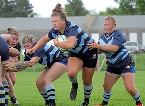 Kaedynce Tuttosi carries the ball for the Brandon Barbarians against the Winnipeg Wasps in Rugby Manitoba women's league action at John Reilly Field on Saturday. The Wasps won 34-17 on four tries in the last 20 minutes. (Thomas Friesen/The Brandon Sun)