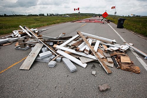 JOHN WOODS / WINNIPEG FREE PRESS
People still block a road to the city&#x2019;s Brady Road landfill despite a court injunction to vacate the area in Winnipeg, Sunday, June 16, 2023. The group is protesting the province&#x2019;s refusal to pay for a search a landfill.

Reporter: macintosh