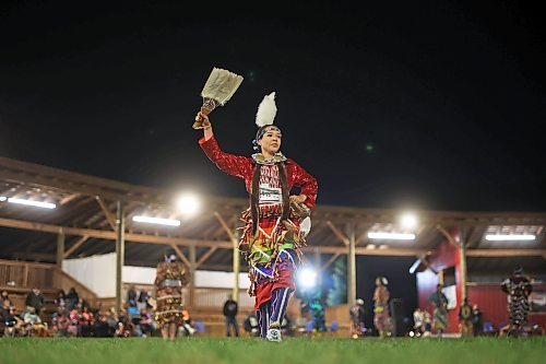 Helena Soto of Enoch Cree Nation dances in a jingle dance category at the Sioux Valley Dakota Nation Dakota Oyate Wacipi Powwow late Friday evening. The powwow featured a new two-storey arbour that was built by Keller Developments. (Tim Smith/The Brandon Sun)
