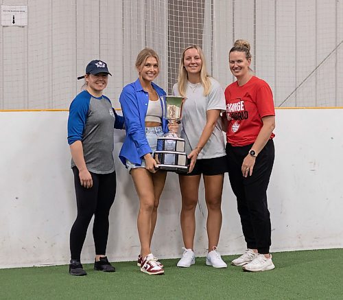 Mike Thiessen / Winnipeg Free Press 
Toronto Six&#x2019; Manitoban defense players Taylor Woods (from left), Alexis Woloschuk, and Kati Tabin, and Sami Jo Small, the team&#x2019;s president, with the Isobel Cup. The Cup is being taken around Manitoba by the trio following the Six winning the league championship in March. For Mike Sawatzky. 230717 &#x2013; Monday, July 17, 2023