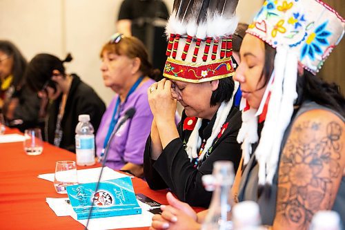 MIKAELA MACKENZIE / WINNIPEG FREE PRESS

AMC grand chief Cathy Merrick lowers her head during the closing prayers at a press conference (held in response to the Stefanson government&#x573; refusal to search the landfills) on Monday, July 17, 2023. For Chris Kitching story.
Winnipeg Free Press 2023.