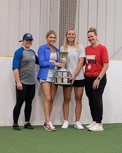 Mike Thiessen / Winnipeg Free Press 
Toronto Six&#x2019; Manitoban defense players Taylor Woods (from left), Alexis Woloschuk, and Kati Tabin, and Sami Jo Small, the team&#x2019;s president, with the Isobel Cup. The Cup is being taken around Manitoba by the trio following the Six winning the league championship in March. For Mike Sawatzky. 230717 &#x2013; Monday, July 17, 2023