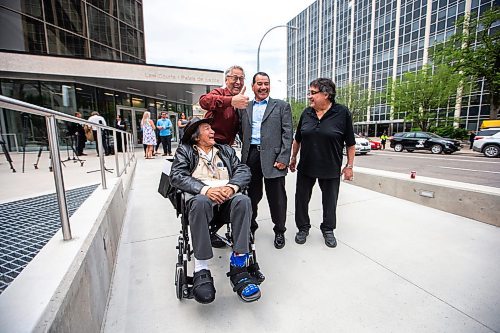 MIKAELA MACKENZIE / WINNIPEG FREE PRESS

Allan Woodhouse (left), Tom Sophonow, Brian Anderson, and Frank Ostrowski pose for a photo at the Law Courts on Tuesday, July 18, 2023. For Katrina Clarke story.
Winnipeg Free Press 2023.