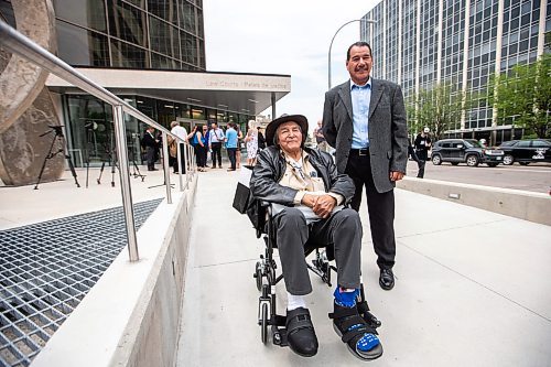 MIKAELA MACKENZIE / WINNIPEG FREE PRESS

Allan Woodhouse (left) and Brian Anderson pose for a photo after exiting the Law Courts as innocent men (after being wrongfully convicted  of murder decades ago) on Tuesday, July 18, 2023. For Katrina Clarke story.
Winnipeg Free Press 2023.