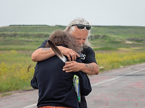JESSICA LEE / WINNIPEG FREE PRESS

Protestor Joseph Munro hugs a wailing protestor July 18, 2023 after the removal of the blockade at Brady Landfill earlier that morning.

Reporter: Chris Kitching