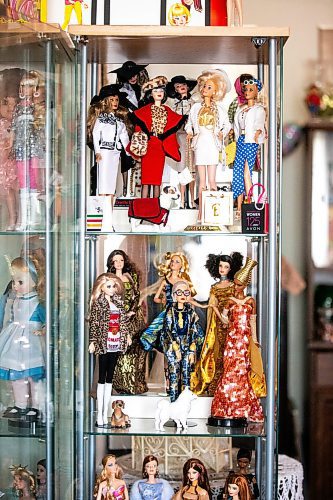 MIKAELA MACKENZIE / WINNIPEG FREE PRESS

President of the Manitoba Dolls Club Lucy Cook&#x573; impressive Barbie collection on Thursday, July 13, 2023.  For AV Kitching story.
Winnipeg Free Press 2023.