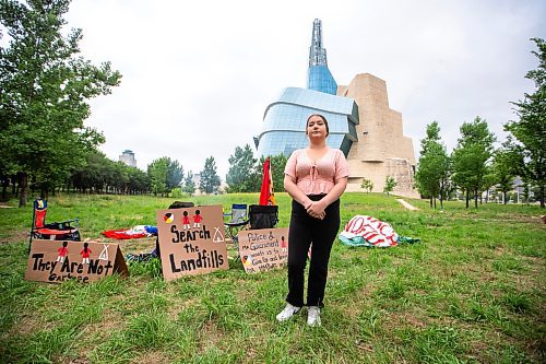 MIKAELA MACKENZIE / WINNIPEG FREE PRESS

Jorden Myran poses for a photo at Camp Marcedes (which is by the Canadian Museum for Human Rights) on Wednesday, July 19, 2023. For Chris story.
Winnipeg Free Press 2023.