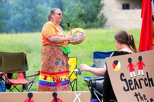 MIKAELA MACKENZIE / WINNIPEG FREE PRESS

Hummingbird (left) and Jorden Myran sing a water song at Camp Marcedes (which is by the Canadian Museum for Human Rights) on Wednesday, July 19, 2023. For Chris story.
Winnipeg Free Press 2023.