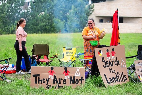 MIKAELA MACKENZIE / WINNIPEG FREE PRESS

Jorden Myran (left) and Hummingbird sing a water song at Camp Marcedes (which is by the Canadian Museum for Human Rights) on Wednesday, July 19, 2023. For Chris story.
Winnipeg Free Press 2023.