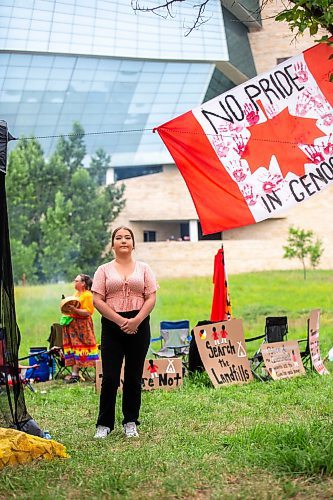 MIKAELA MACKENZIE / WINNIPEG FREE PRESS

Jorden Myran poses for a photo at Camp Marcedes (which is by the Canadian Museum for Human Rights) on Wednesday, July 19, 2023. For Chris story.
Winnipeg Free Press 2023.