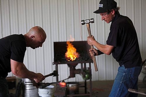 19072023
Ben Mangan and Justin Fountain with High Country Horseshoes hone their craft on Wednesday in preparation for the World Heavy Horseshoeing Championships during the 2023 World Clydesdale Show at the Keystone Centre in Brandon on Wednesday.
(Tim Smith/The Brandon Sun)