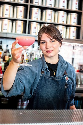 MIKAELA MACKENZIE / WINNIPEG FREE PRESS

Melaney Droguett serves up a Malibu Barbie cocktail at the Amsterdam Tea House on Wednesday, July 12, 2023.  For AV Kitching story.
Winnipeg Free Press 2023.