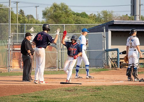 JESSICA LEE / WINNIPEG FREE PRESS

Elmwood Giants player Justin Scott high fives a teammate at home plate during the first inning July 19, 2023 at Koskie Field during a game against the Altona Bisons.

Stand up