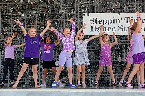 Steppin’ Time Dance Studio held a dance recital at the Riverbank Discovery Centre Fusion Credit Union Stage on Thursday as the culmination of the studio’s four-day summer dance camp. Family and friends lined the sitting area in front of the stage as young dancers performed for the crowd. More photos on Page A4. (Tim Smith/The Brandon Sun)