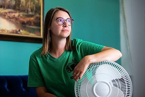 MIKAELA MACKENZIE / WINNIPEG FREE PRESS

Bethany Daman, who works on climate advocacy in Manitoba and has seen the impacts of extreme heat in her neighbourhood, at her home in Winnipeg on Thursday, July 20, 2023. For JS Rutgers story.
Winnipeg Free Press 2023