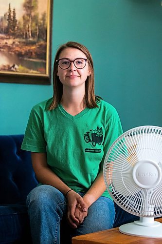 MIKAELA MACKENZIE / WINNIPEG FREE PRESS

Bethany Daman, who works on climate advocacy in Manitoba and has seen the impacts of extreme heat in her neighbourhood, at her home in Winnipeg on Thursday, July 20, 2023. For JS Rutgers story.
Winnipeg Free Press 2023