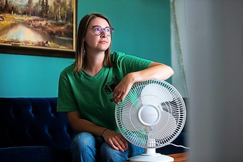 MIKAELA MACKENZIE / WINNIPEG FREE PRESS

Bethany Daman, who works on climate advocacy in Manitoba and has seen the impacts of extreme heat in her neighbourhood, at her home in Winnipeg on Thursday, July 20, 2023. For JS Rutgers story.
Winnipeg Free Press 2023