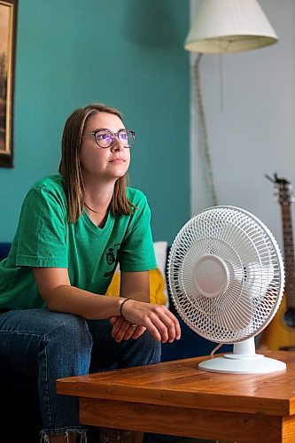 MIKAELA MACKENZIE / WINNIPEG FREE PRESS

Bethany Daman, who works on climate advocacy in Manitoba and has seen the impacts of extreme heat in her neighbourhood, at her home in Winnipeg on Thursday, July 20, 2023. For JS Rutgers story.
Winnipeg Free Press 2023