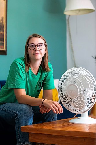 MIKAELA MACKENZIE / WINNIPEG FREE PRESS

Bethany Daman, who works on climate advocacy in Manitoba and has seen the impacts of extreme heat in her neighbourhood, at her home in Winnipeg on Thursday, July 20, 2023. For JS Rutgers story.
Winnipeg Free Press 2023