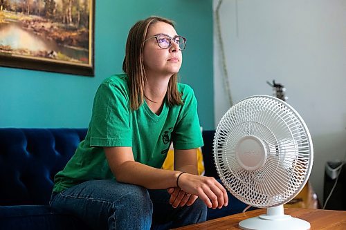 MIKAELA MACKENZIE / WINNIPEG FREE PRESS

Bethany Daman, who works on climate advocacy in Manitoba and has seen the impacts of extreme heat in her neighbourhood, at her home in Winnipeg on Thursday, July 20, 2023. For JS Rutgers story.
Winnipeg Free Press 2023