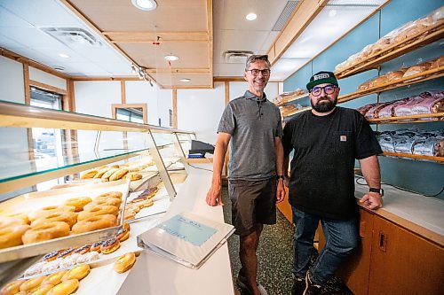 MIKAELA MACKENZIE / WINNIPEG FREE PRESS

Russ Meier (long-time owner of the Donut House, left) and Jon Hochman (owner of Gunn&#x573; Bakery and new owner of the Donut House) at the Donut House on Selkirk Avenue on Friday, July 21, 2023. For &#x460;story.
Winnipeg Free Press 2023