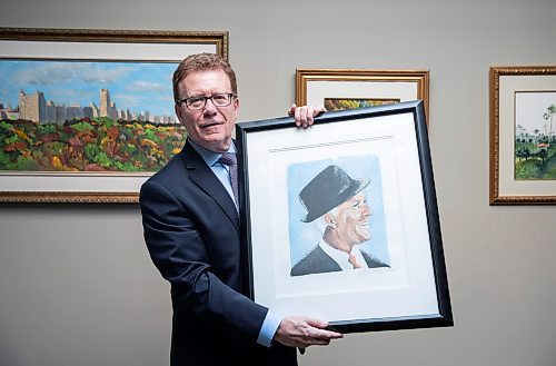 JESSICA LEE / WINNIPEG FREE PRESS

Lawyer Ian Restall, a huge Tony Bennett fan, holds art by Tony, July 21, 2023 in his law office. Behind him are paintings by Tony.

Reporter: Kevin??