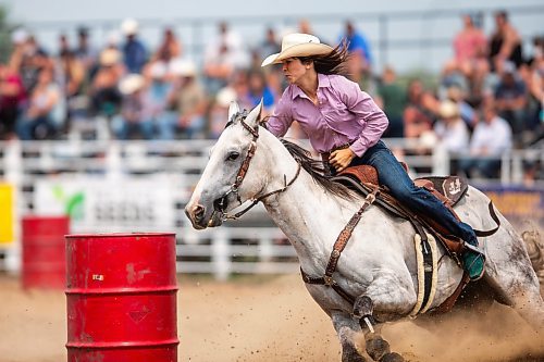 MIKAELA MACKENZIE / WINNIPEG FREE PRESS

Mariah Mannering turns a corner during the ladies barrel racing event at the Manitoba Stampede in Morris on Saturday, July 22, 2023. For Tyler story.
Winnipeg Free Press 2023