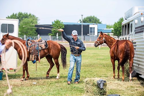 MIKAELA MACKENZIE / WINNIPEG FREE PRESS

Austin Hines practices his ropework before the rodeo starts at the Manitoba Stampede in Morris on Saturday, July 22, 2023. For Tyler story.
Winnipeg Free Press 2023