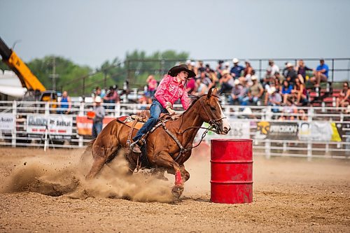 MIKAELA MACKENZIE / WINNIPEG FREE PRESS

Lane Wills whips around a corner during the ladies barrel racing event at the Manitoba Stampede in Morris on Saturday, July 22, 2023. For Tyler story.
Winnipeg Free Press 2023