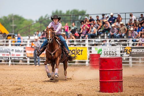 MIKAELA MACKENZIE / WINNIPEG FREE PRESS

Brooke Wills speeds through the ladies barrel racing event at the Manitoba Stampede in Morris on Saturday, July 22, 2023. For Tyler story.
Winnipeg Free Press 2023