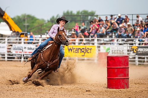 MIKAELA MACKENZIE / WINNIPEG FREE PRESS

Brooke Wills speeds through the ladies barrel racing event at the Manitoba Stampede in Morris on Saturday, July 22, 2023. For Tyler story.
Winnipeg Free Press 2023